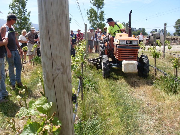 A method of weed suppression demonstrated by Vinetech contractor using a pre 1950's under-vine weeder.